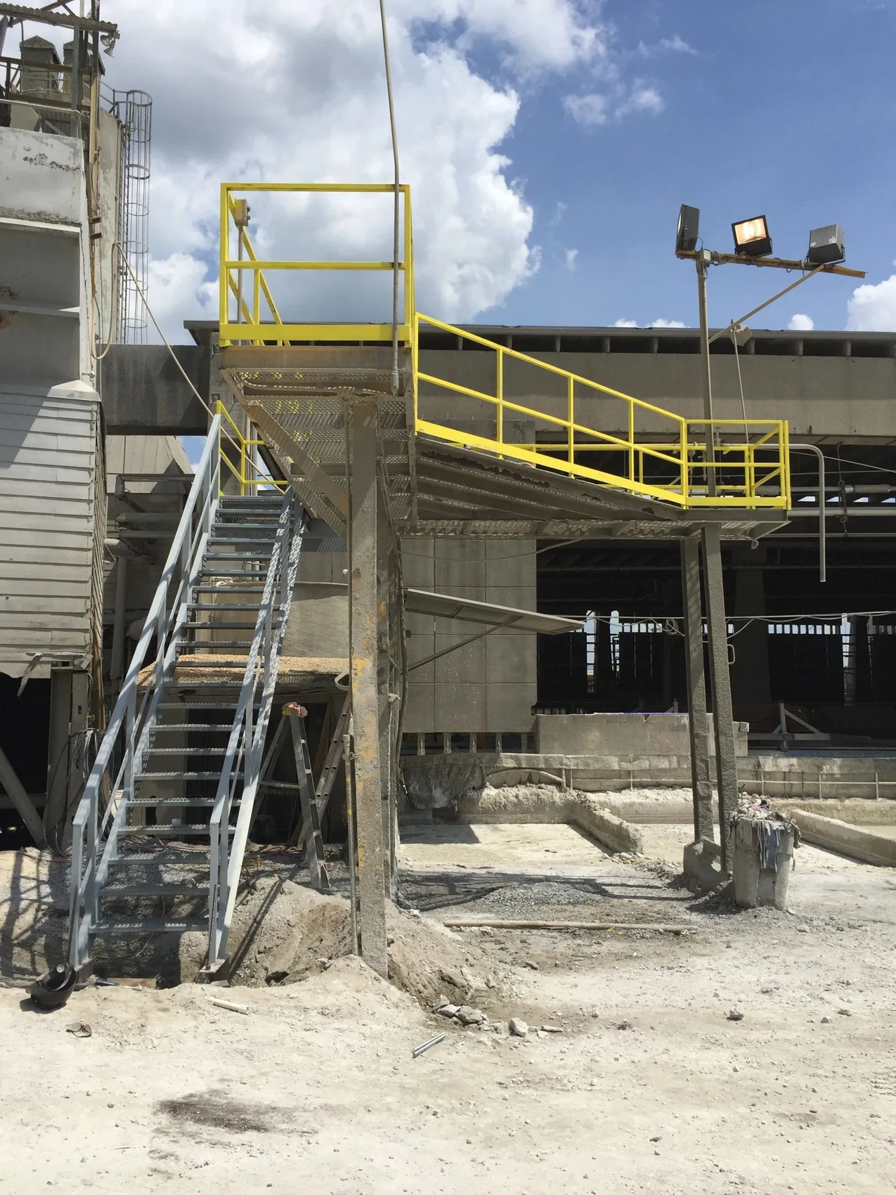 Steel stair and yellow-railed platform from the official Wofford gallery