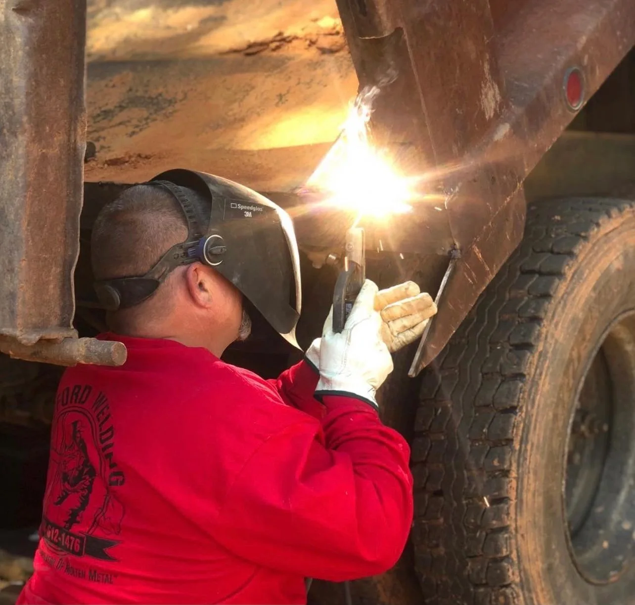 Wofford welder working on a steel component, photographed on the official website